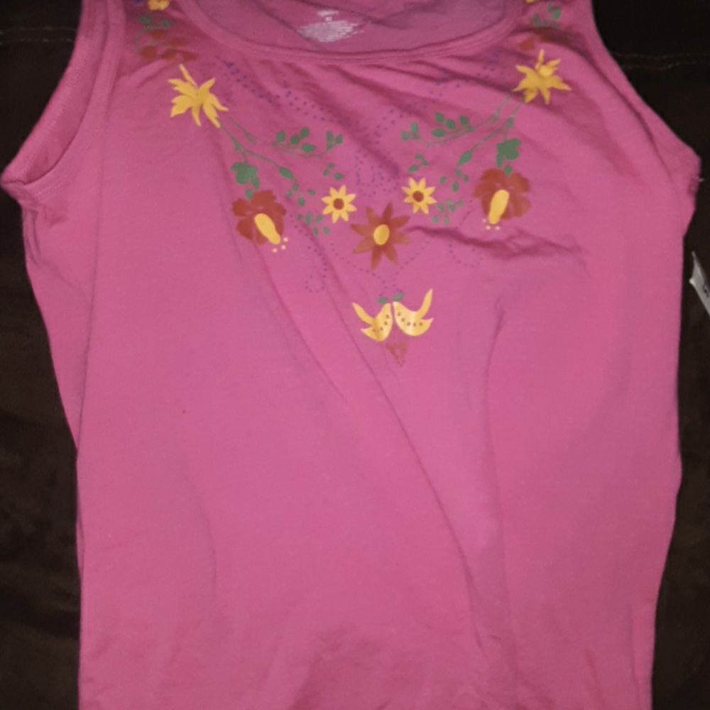 A Pink Tank Top With Flowers